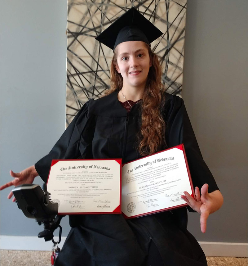 Morgan with diploma